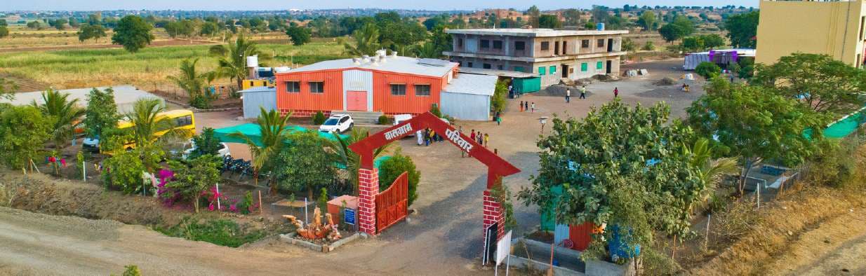 Balgram Parivar campus gate and buildings near Georai