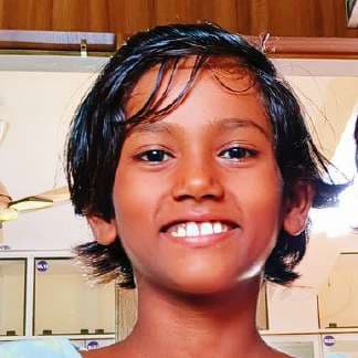 A child at Balgram smiling